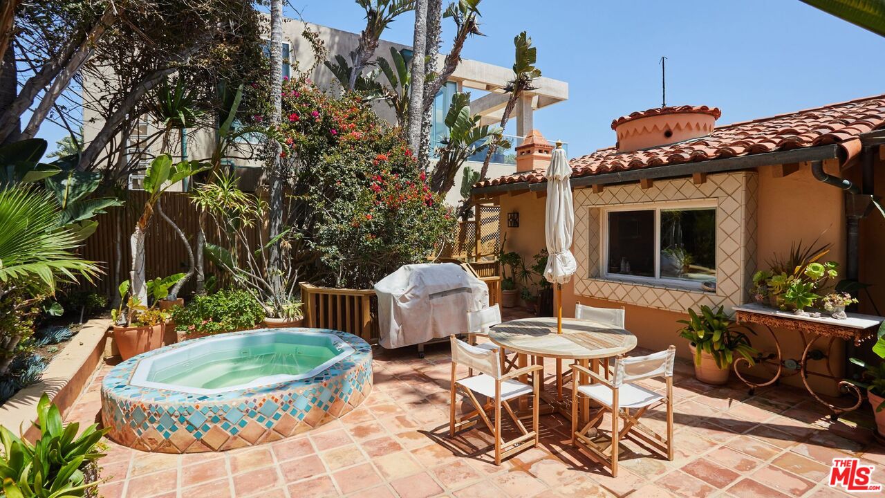 25110 Malibu Road Malibu, CA 90265 - Photo 9 of 28 a backyard of a house with outdoor seating