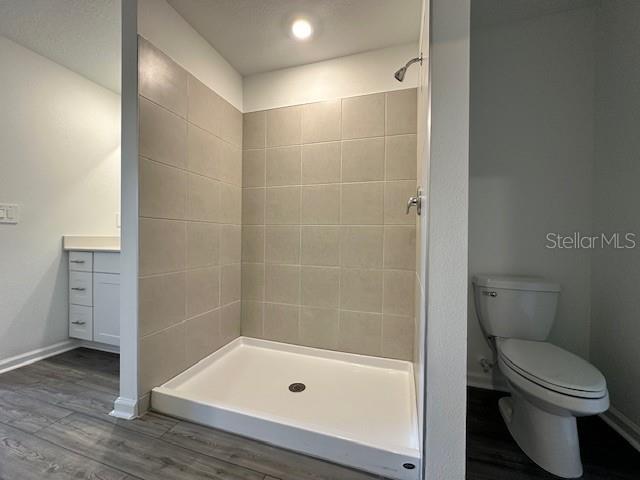 4534 Southwest 84th St Road Ocala, FL 34476 - Photo 20 of 31 a bathroom with a toilet and a shower