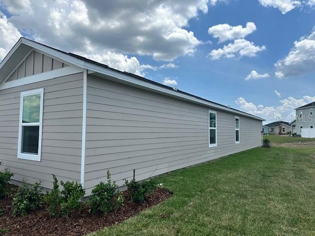 4534 Southwest 84th St Road Ocala, FL 34476 - Photo 2 of 31 a backyard of a house with lots of green space