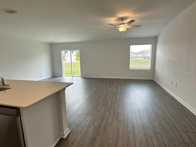 4534 Southwest 84th St Road Ocala, FL 34476 - Photo 29 of 31 an empty room with wooden floor and windows