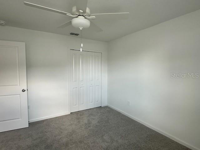 4534 Southwest 84th St Road Ocala, FL 34476 - Photo 9 of 31 an empty room with a ceiling fan and a window