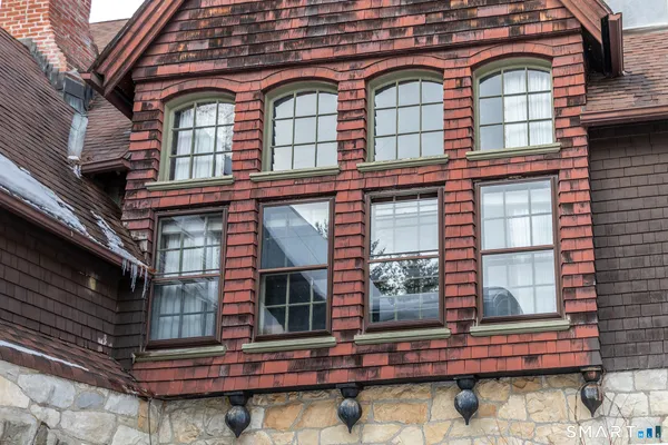 a front view of a building with glass windows