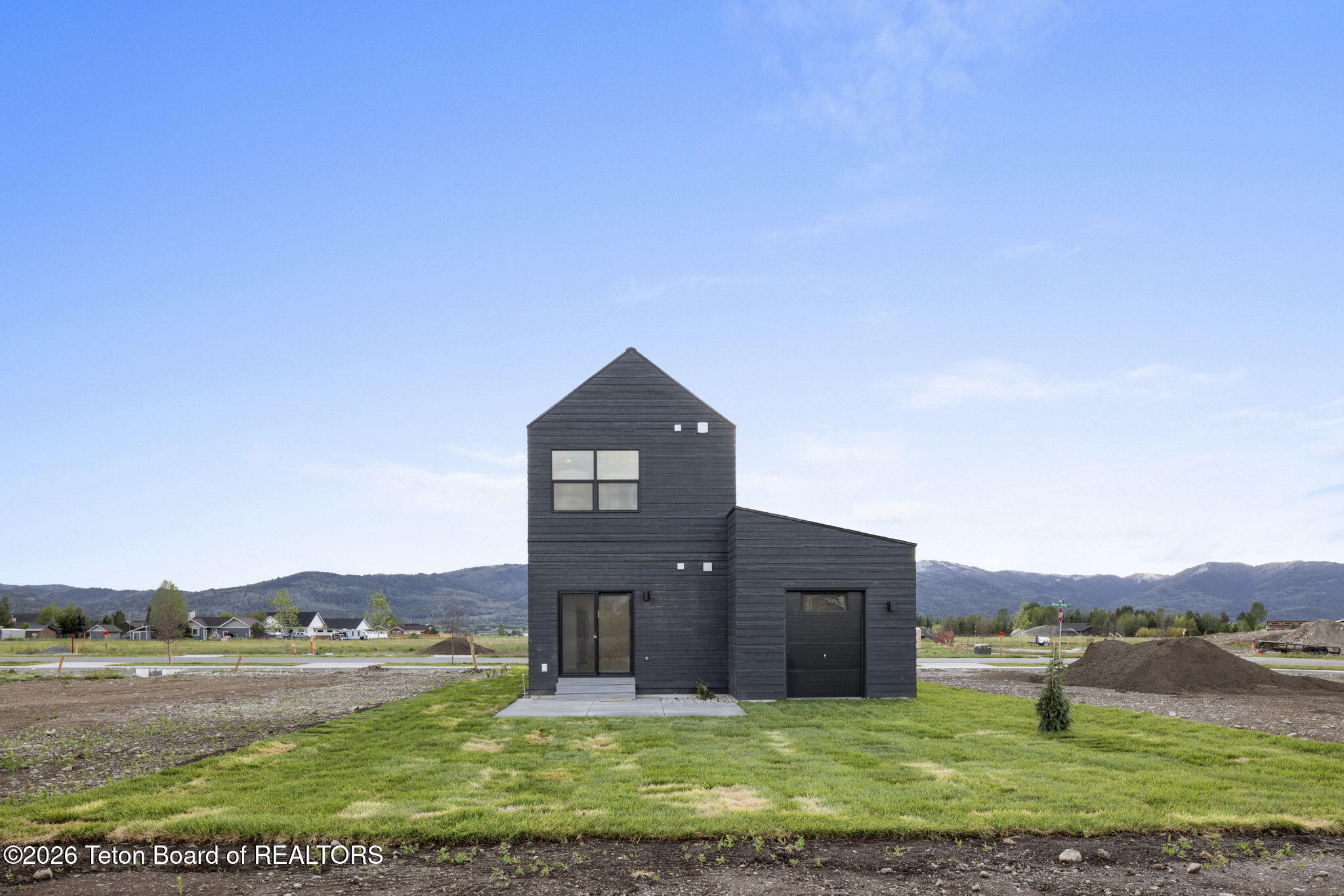 8747 Windy Ridge Road Victor, ID 83455 - Photo 3 of 21 Edelweiss Backyard View