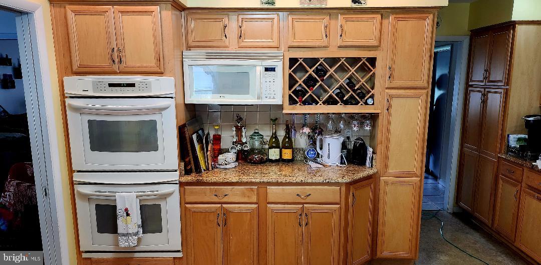 4429 Green Valley Road Monrovia, MD 21770 - Photo 12 of 23 Double ovens, wine rack and pantry.