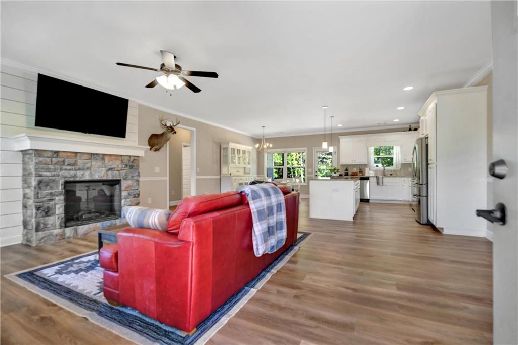90 Scouts Ridge Drive Covington, GA 30016 - Photo 4 of 21 a living room with furniture fireplace and flat screen tv