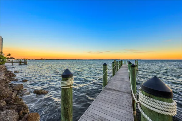 a view of a park with houses