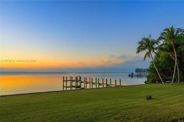 a view of outside space and a lake view