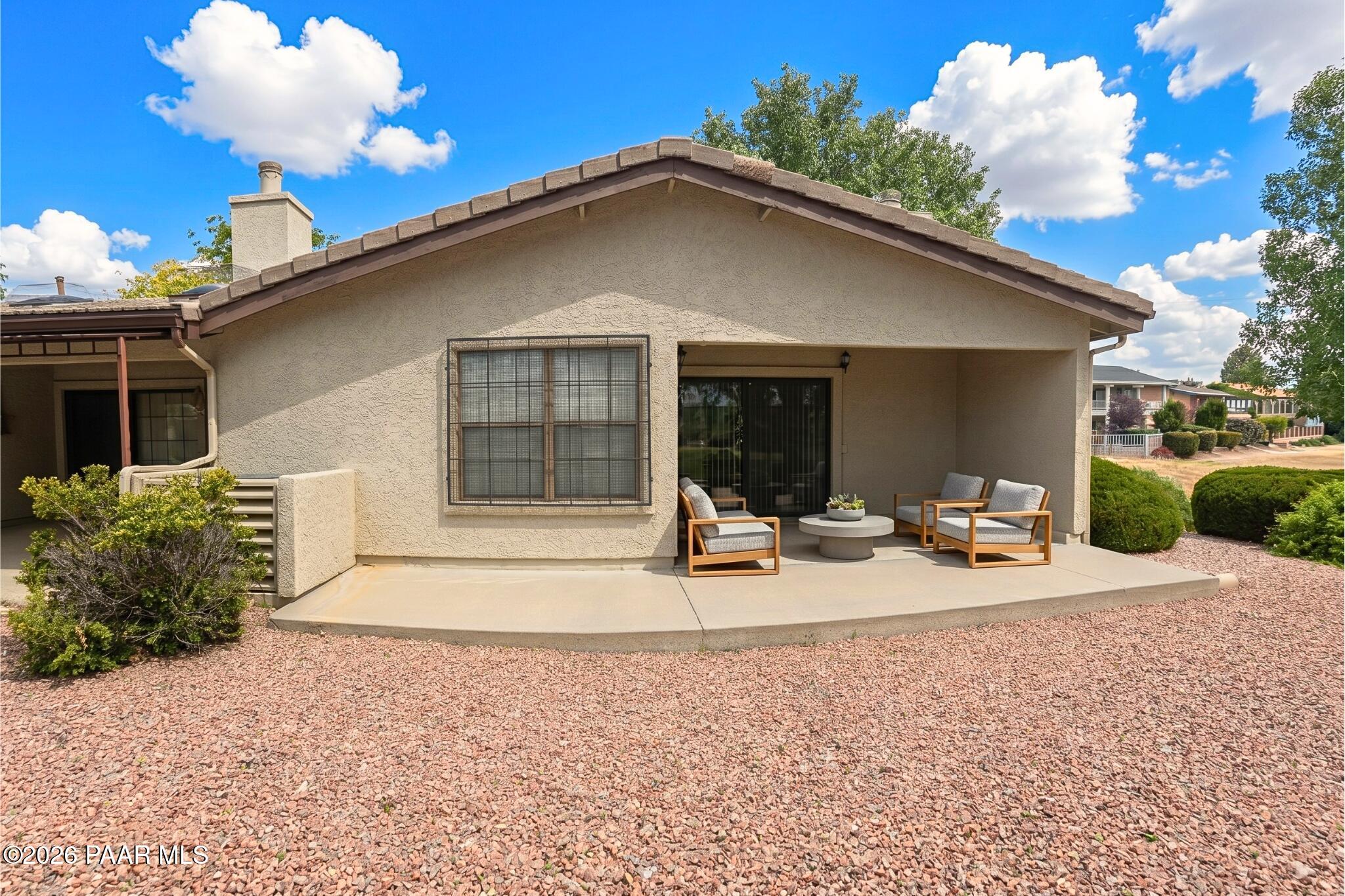 908 Rolling Green Road Dewey, AZ 86327 - Photo 7 of 13 a view of a house with backyard and sitting area