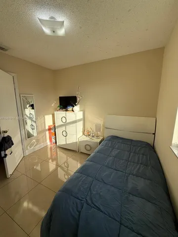 a view of a livingroom with furniture and windows