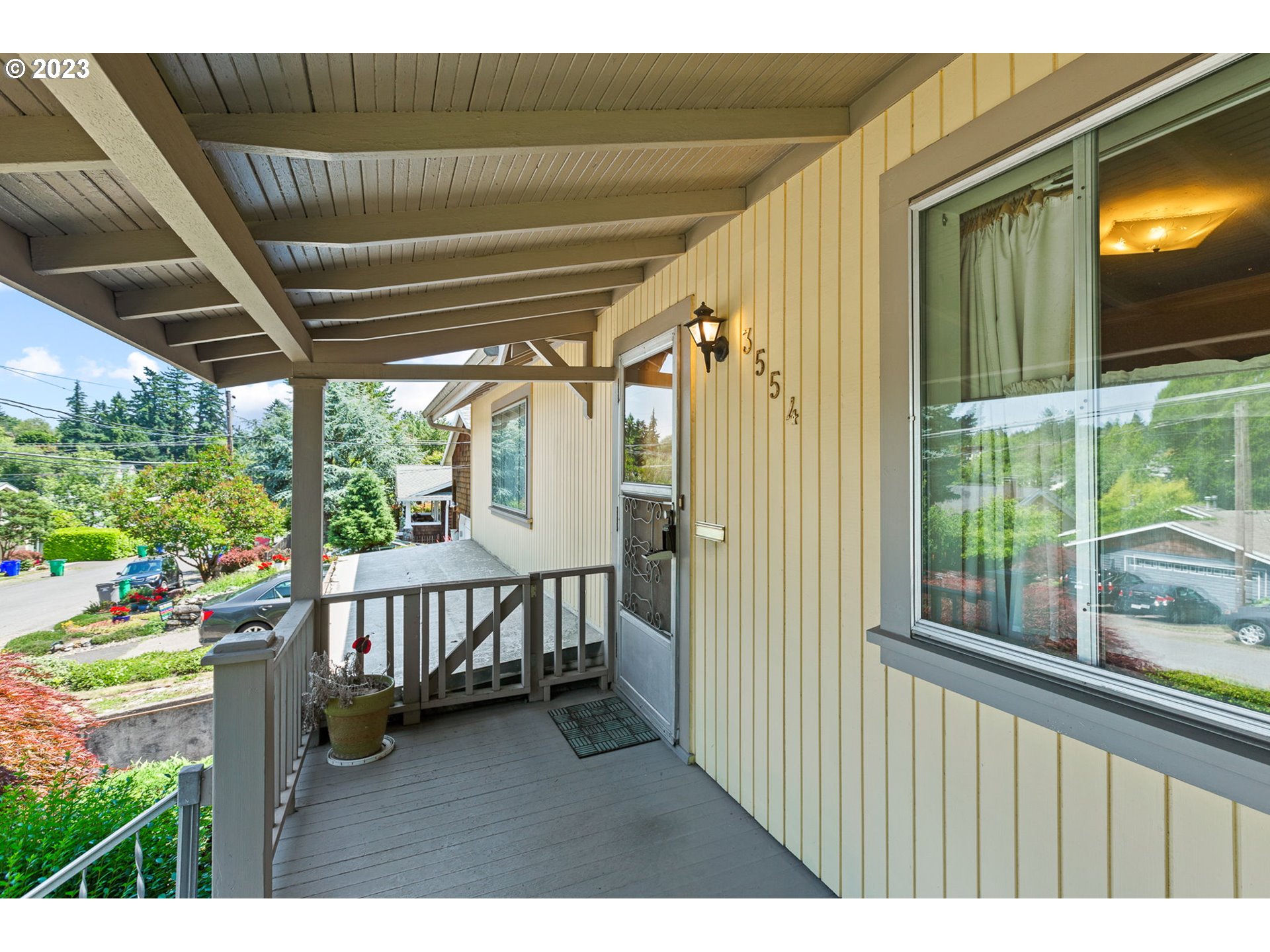 3554 Southwest Falcon Street Portland, OR 97219 - Photo 21 of 23 a view of a porch with furniture