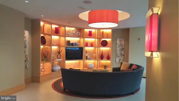 a room with furniture and a chandelier