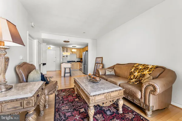 a living room with furniture and a table