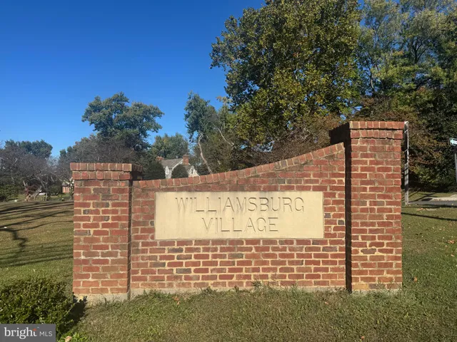 a view of a porch with chairs and backyard