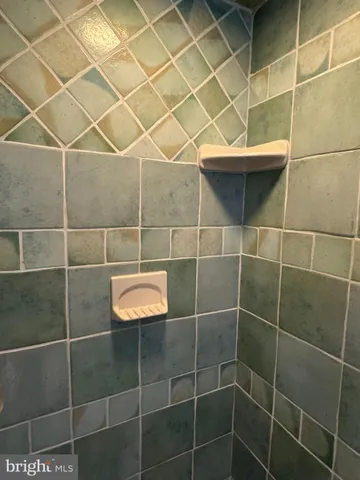 a picture of a bathroom with a sink and a picture of floor