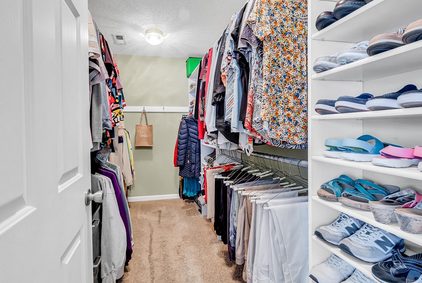 728 7th Avenue South Surfside Beach, SC 29575 - Photo 29 of 52 Primary Bedroom Walk-In Closet features custom racks & shelving