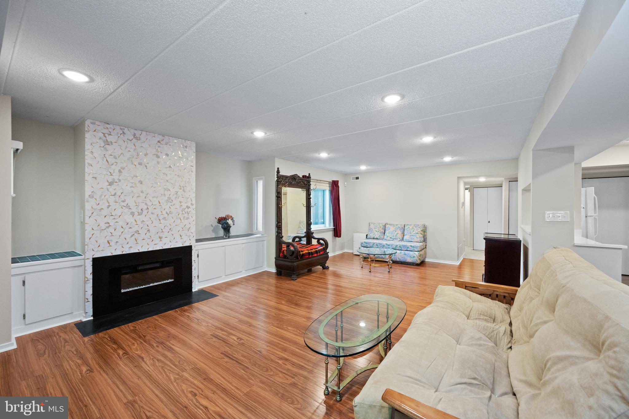 5653 Harpers Farm Road, Unit B Columbia, MD 21044 - Photo 8 of 29 Living room fireplace