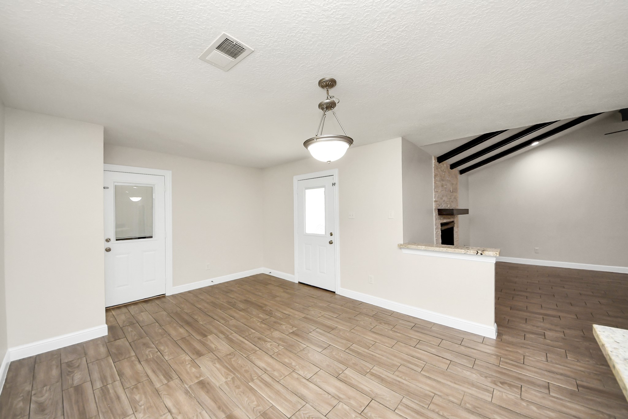 19435 Interstate 45 Spring, TX 77388 - Photo 14 of 24 a big room with wooden floor and windows