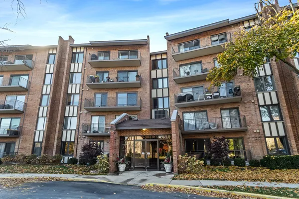 a front view of a multi story residential apartment building