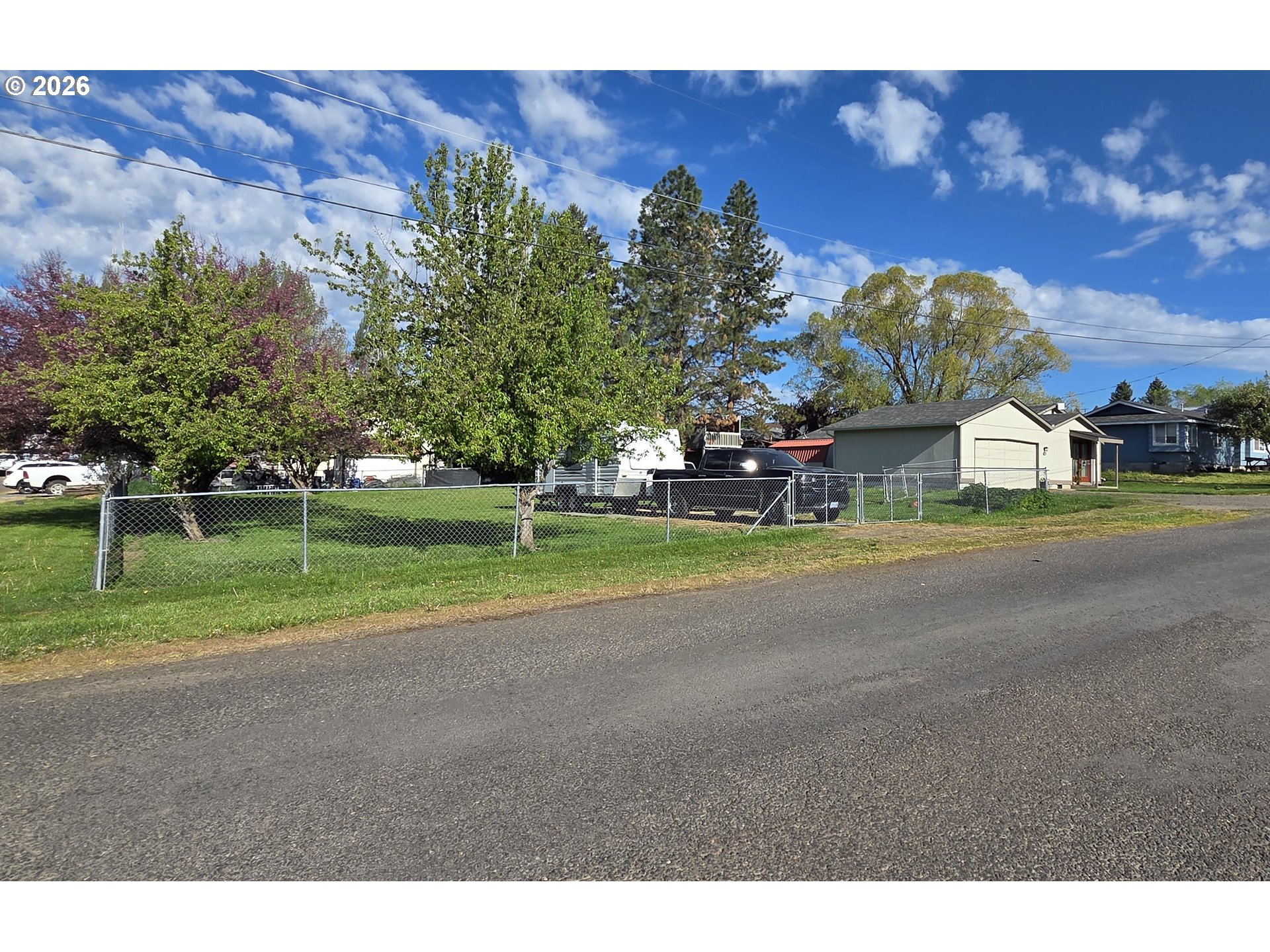 740 North 11th Street Elgin, OR 97827 - Photo 19 of 20 a view of a park with large trees