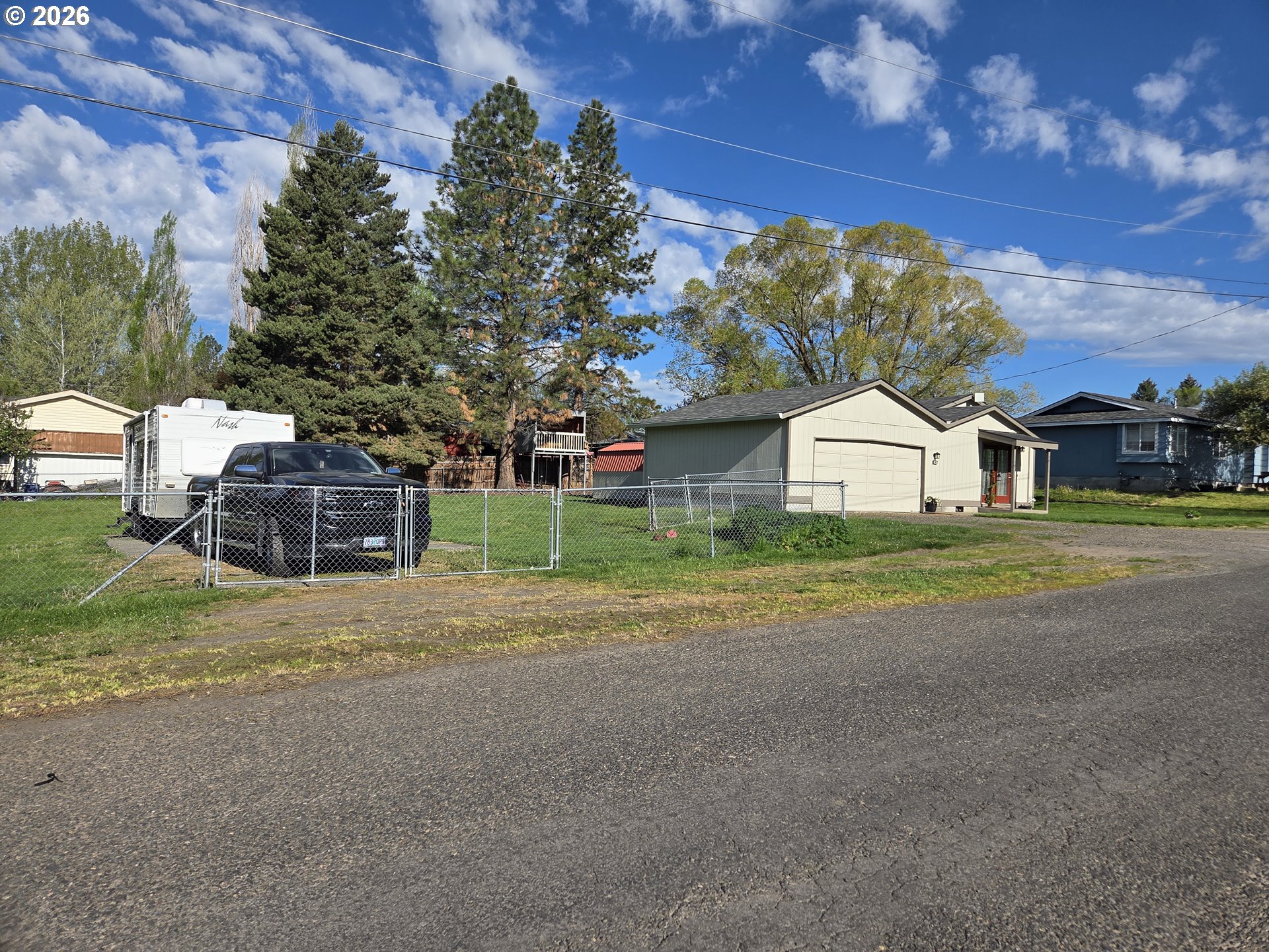 740 North 11th Street Elgin, OR 97827 - Photo 20 of 20 a front view of a house with a yard