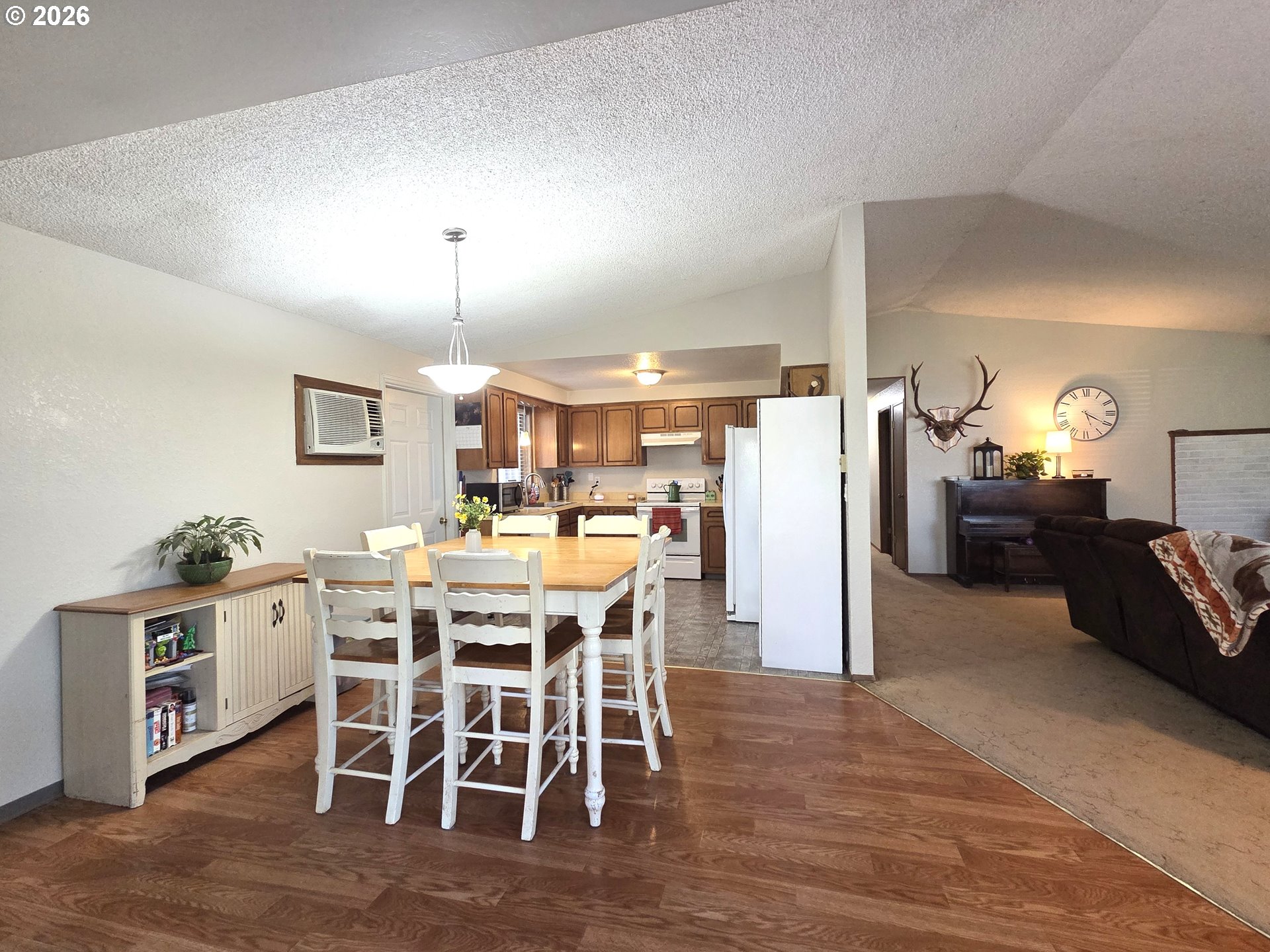 740 North 11th Street Elgin, OR 97827 - Photo 7 of 20 a view of a dining room with furniture