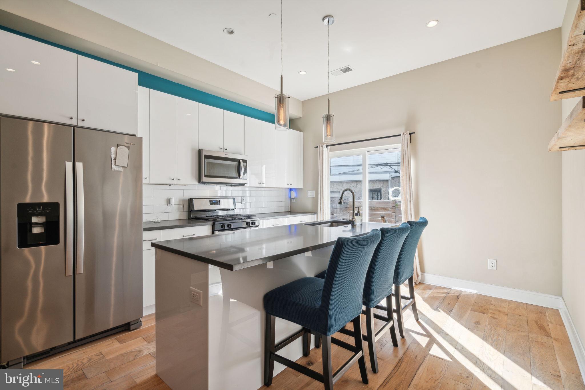 518 Mercy Street Philadelphia, PA 19148 - Photo 37 of 50 Modern kitchen with sleek design.