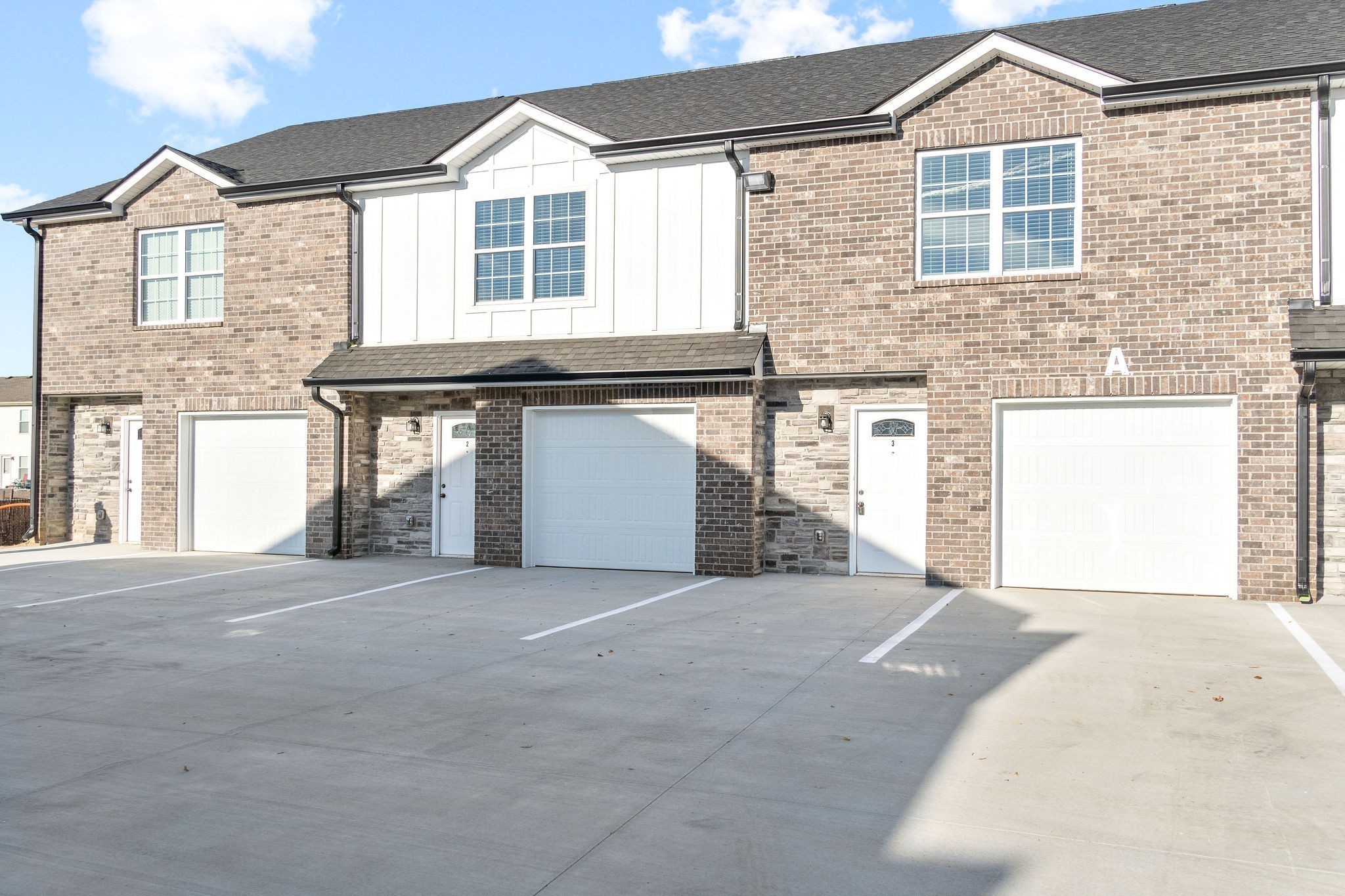 2186 Peachers Mill Road, Unit C5 Clarksville, TN 37042 - Photo 1 of 15 a view of a house with a garage and window