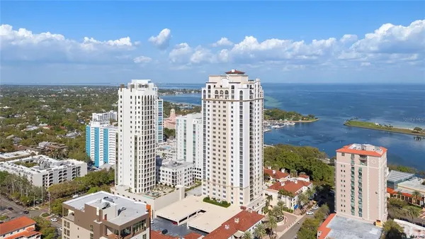 a view of a city with tall buildings