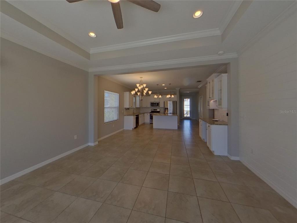 Undisclosed Address Parrish, FL 34219 - Photo 3 of 16 a view of a hallway with seating area