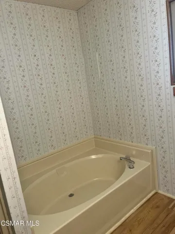a bathroom with a bathtub