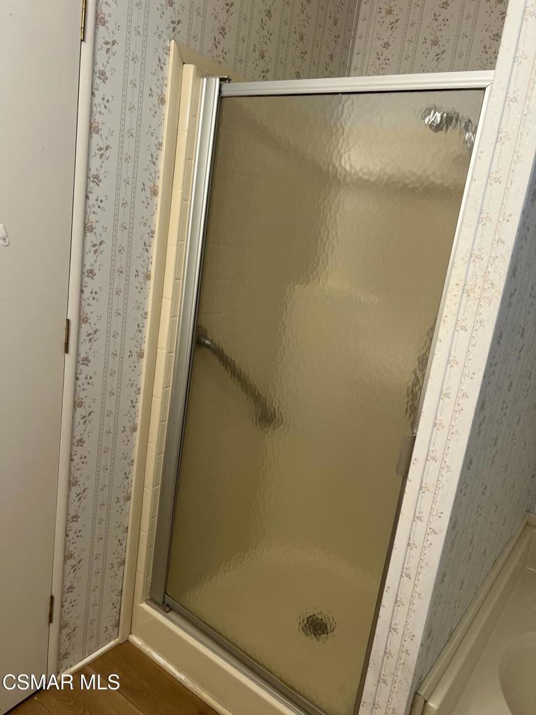 122 Don Felipe, Unit 122 Ojai, CA 93023 - Photo 23 of 50 a bathroom with a glass shower door