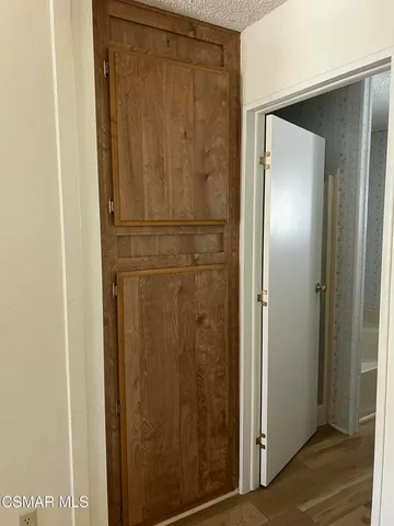 a bathroom with a glass door shower