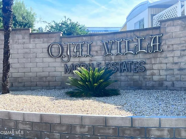 a view of a patio with swimming pool