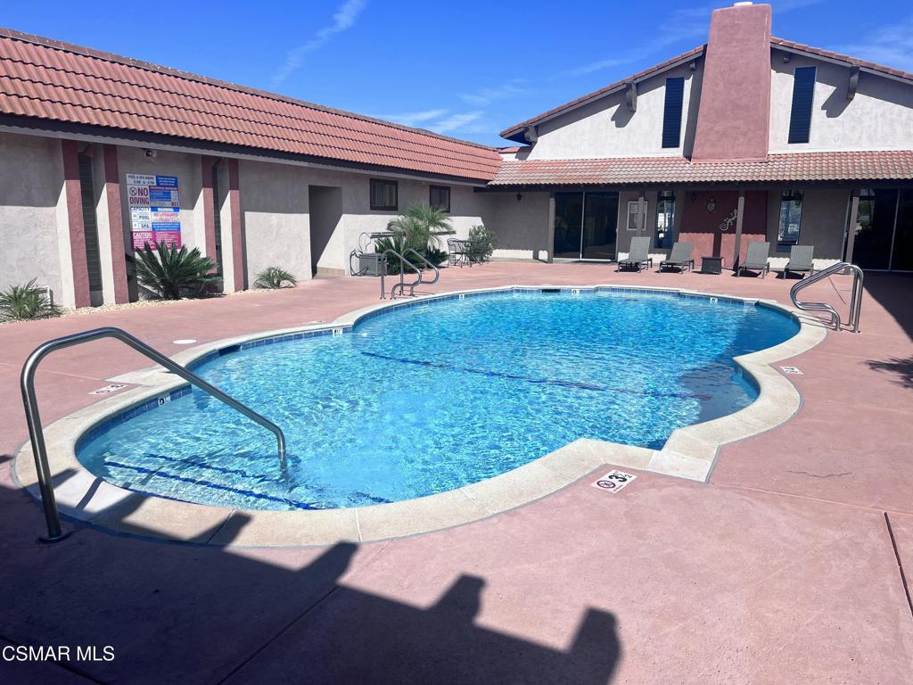 122 Don Felipe, Unit 122 Ojai, CA 93023 - Photo 32 of 50 a view of a patio with swimming pool