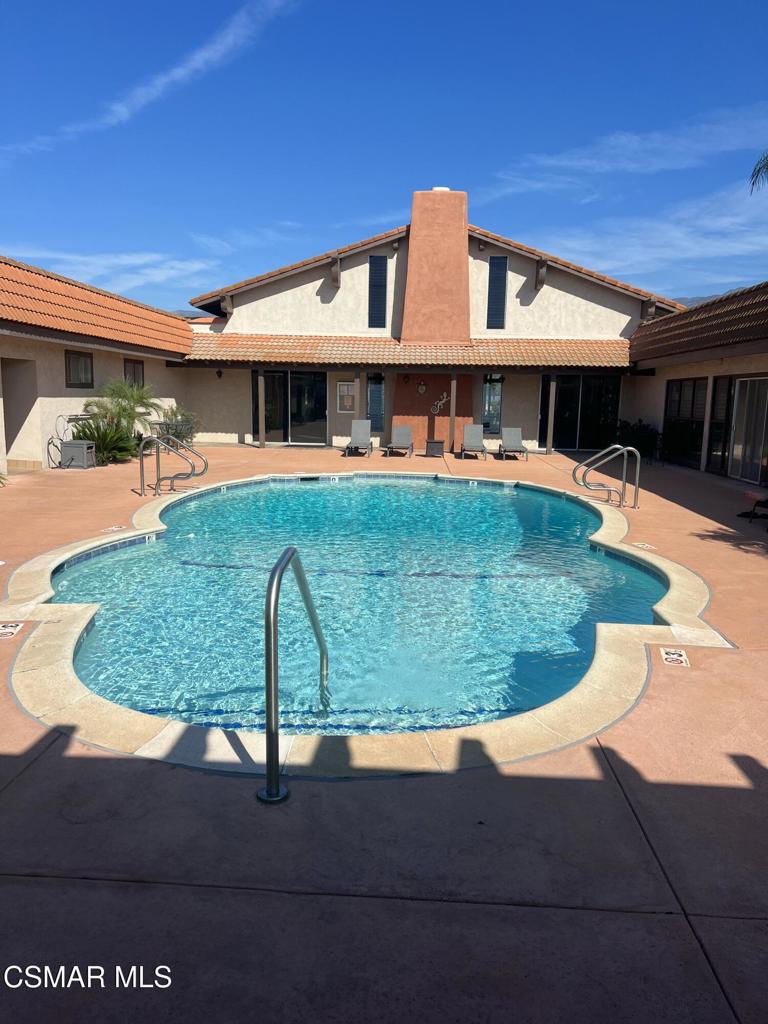 122 Don Felipe, Unit 122 Ojai, CA 93023 - Photo 33 of 50 a front view of a house with a garden