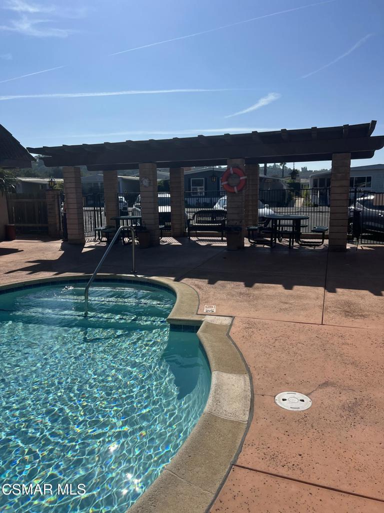 122 Don Felipe, Unit 122 Ojai, CA 93023 - Photo 35 of 50 a view of a terrace with a garden