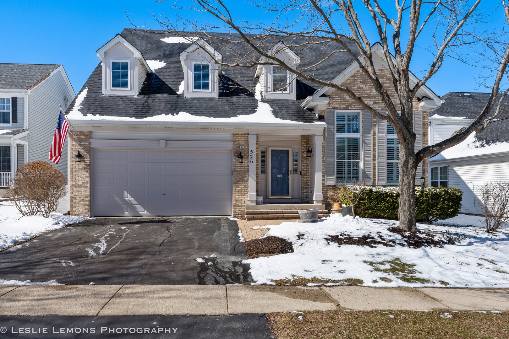 526 Windett Lane Geneva, IL 60134 - Photo 1 of 38 a front view of a house with a yard