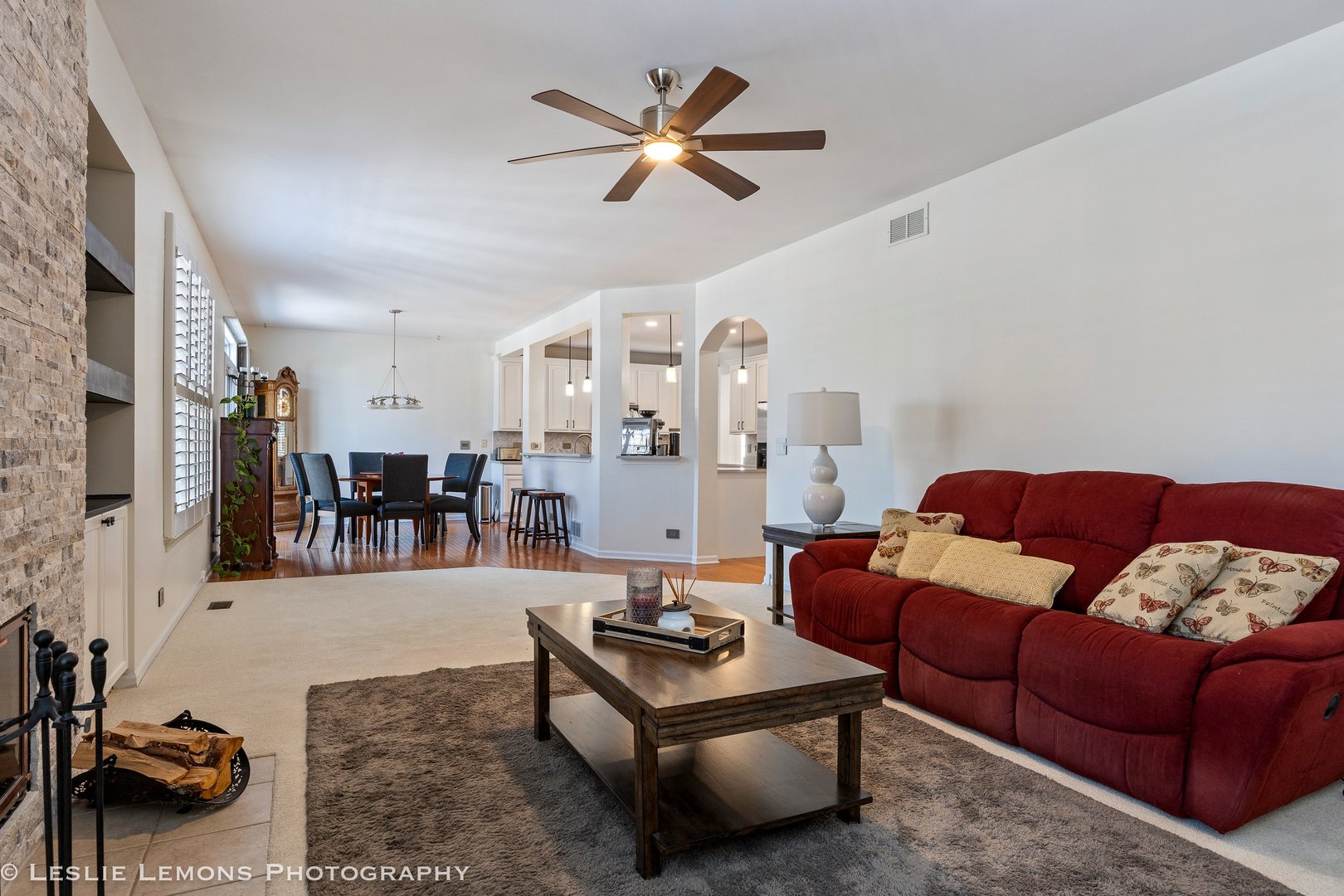 526 Windett Lane Geneva, IL 60134 - Photo 12 of 38 a living room with furniture and a chandelier
