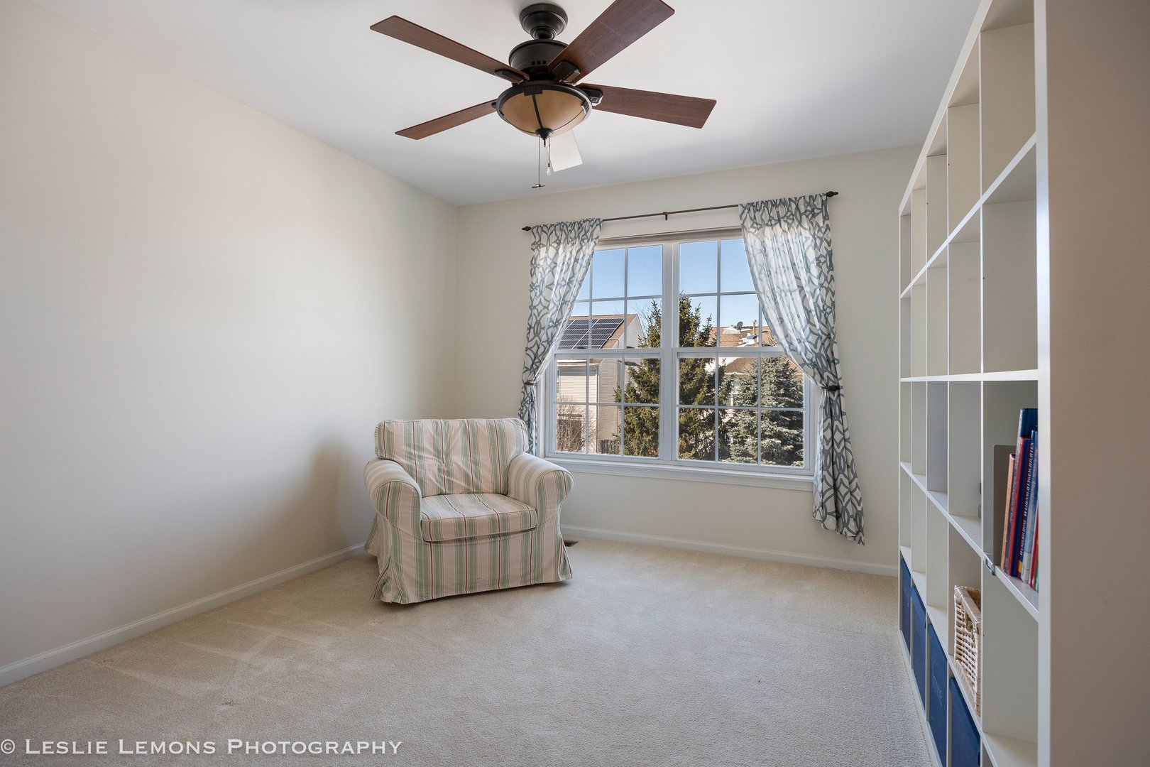 526 Windett Lane Geneva, IL 60134 - Photo 22 of 38 a living room with furniture and a large window