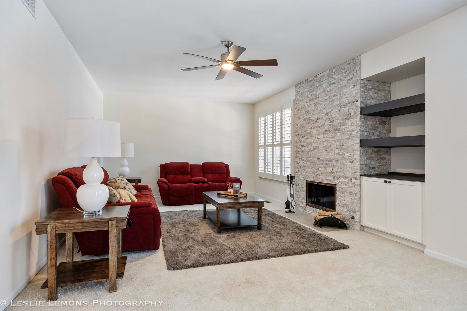 526 Windett Lane Geneva, IL 60134 - Photo 10 of 38 a living room with furniture and a fireplace