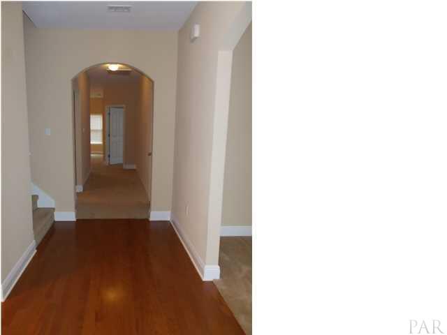 5512 Heatherton Road Milton, FL 32570 - Photo 7 of 25 Hardwood flooring in Foyer.