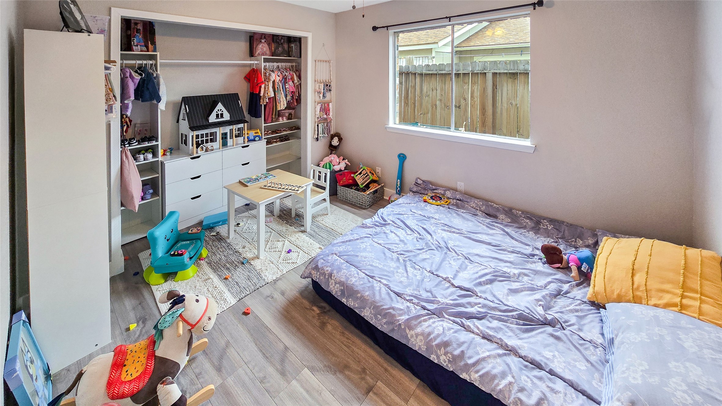 22531 John Rolfe Lane Katy, TX 77449 - Photo 15 of 19 a bedroom with bed and a window