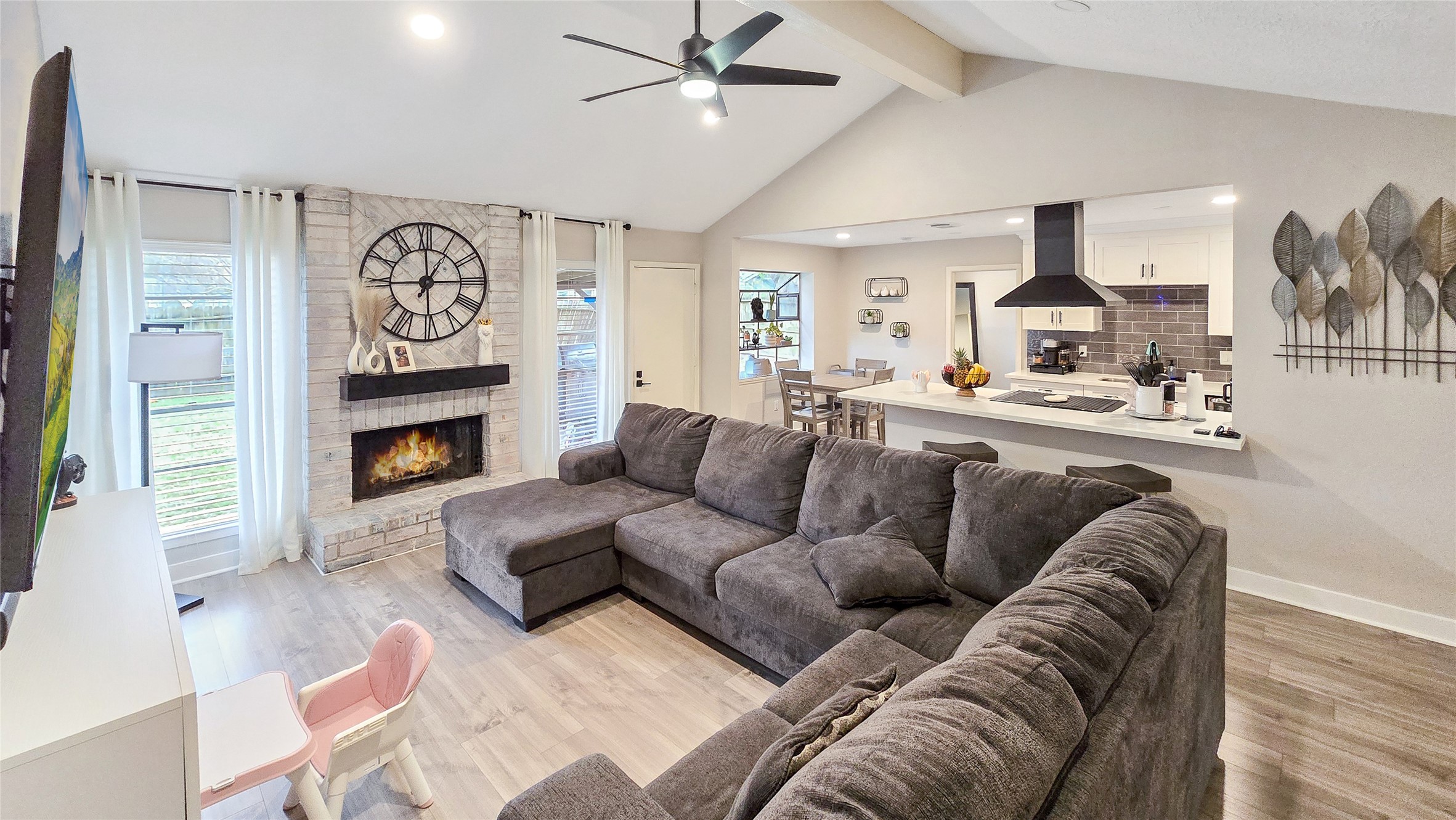 22531 John Rolfe Lane Katy, TX 77449 - Photo 6 of 19 a living room with furniture and a fireplace