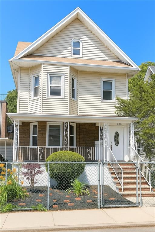 420 Stratford Road Brooklyn, NY 11218 - Photo 1 of 20 a front view of a house with garage