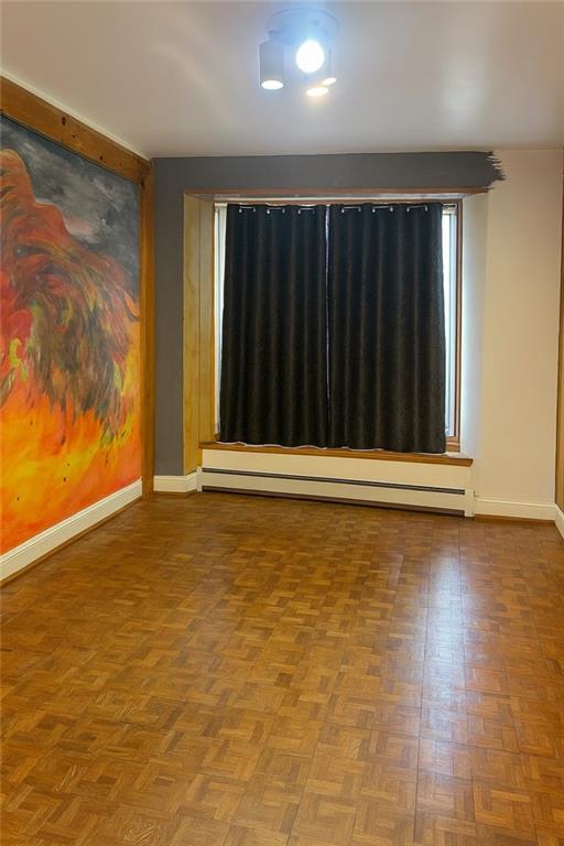 420 Stratford Road Brooklyn, NY 11218 - Photo 14 of 20 en empty room with window