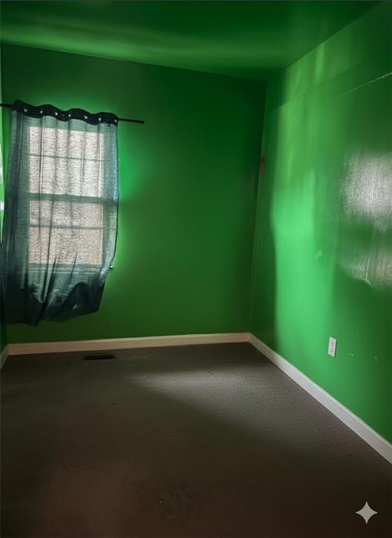 420 Stratford Road Brooklyn, NY 11218 - Photo 15 of 20 a view of an empty room with a window