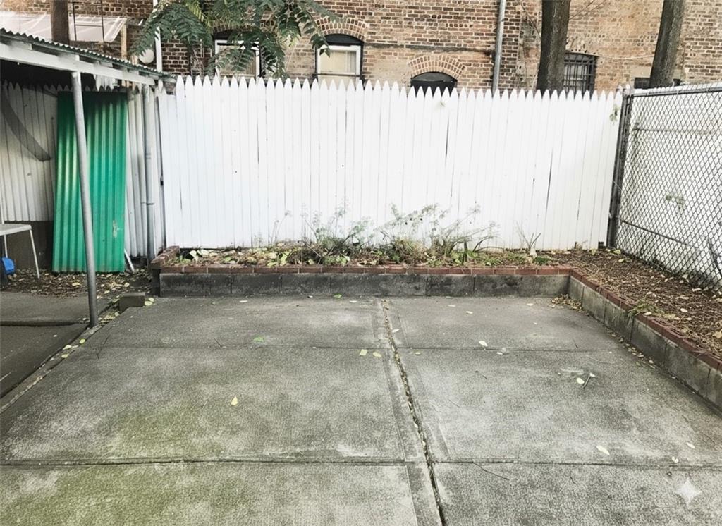 420 Stratford Road Brooklyn, NY 11218 - Photo 5 of 20 a view of a street with a bench