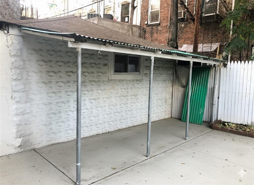 420 Stratford Road Brooklyn, NY 11218 - Photo 6 of 20 a backyard of a house