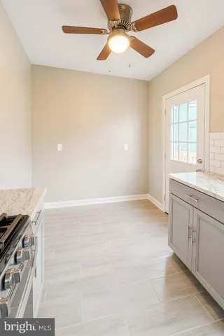 a view of a kitchen with a sink and dishwasher