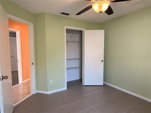an empty room with a bathroom